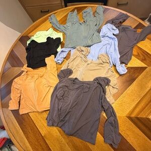 Assorted Bamboo 6-12 month One Pieces Footies and body suits FLAWS 8 pieces